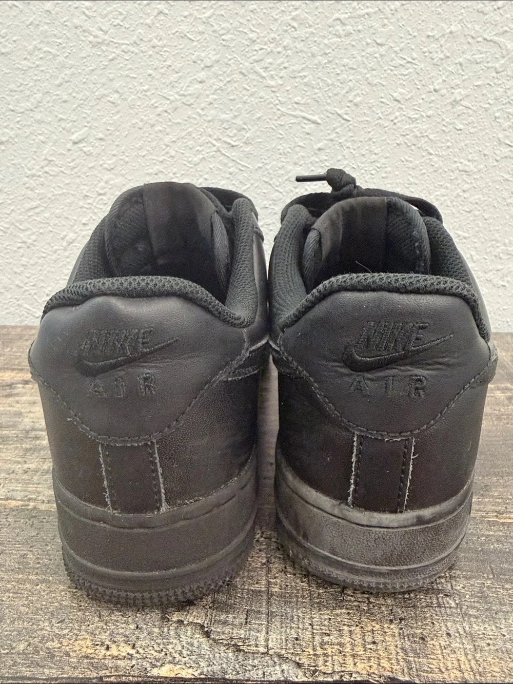 Nike Men's All-Black Leather Low-Top Sneakers